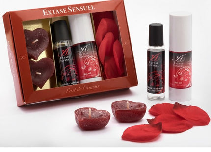 Rote herzförmige kerzen mit gesprenkelter textur und docht im geschenkset extase sensual rote versuchungstruhe