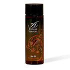 Ein elegantes dunkelbernsteinfarbenes glasfläschchen mit schwarzem verschluss und ornatem orangenblütendesign für extase sensual schokoladen und orangenen öl 100 ml