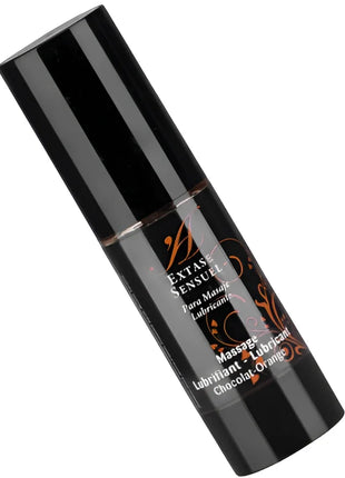 Schwarze zylinderflasche extase sensual massageöl im schokoladen-orange duft mit gold-braunem etikett 30 ml