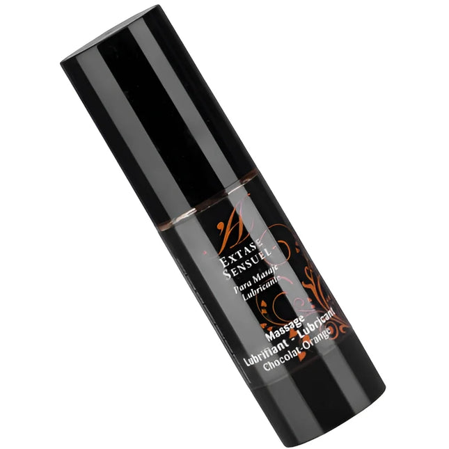 Schwarze zylinderflasche extase sensual massageöl im schokoladen-orange duft mit gold-braunem etikett 30 ml