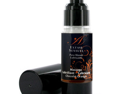 Schwarze pumpflasche extase sensual massageöl mit schokoladen und orangenduft und goldverzierung 30 ml