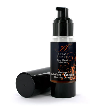 Schwarze pumpflasche extase sensual massageöl mit schokoladen und orangenduft und goldverzierung 30 ml
