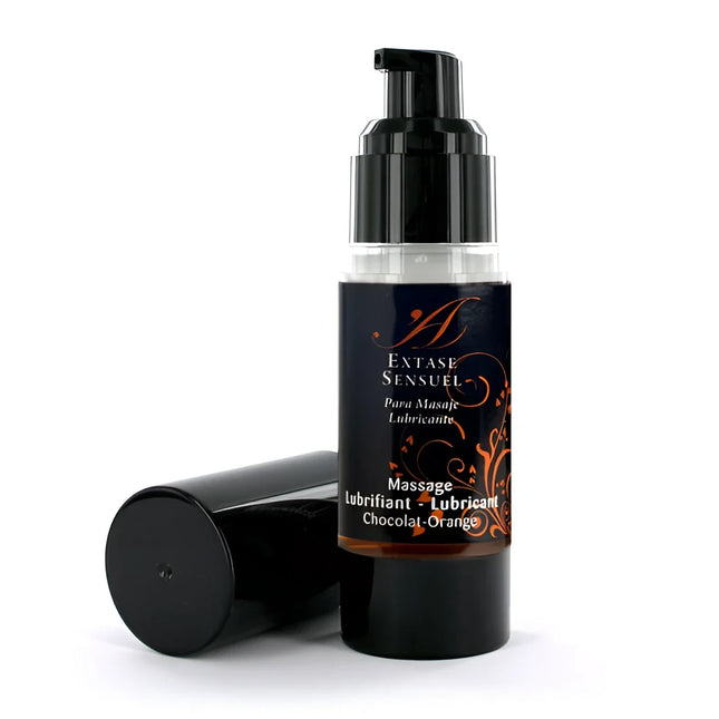 Schwarze pumpflasche extase sensual massageöl mit schokoladen und orangenduft und goldverzierung 30 ml