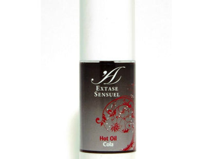 Weiße zylinderförmige flasche mit schwarzem etikett, rotem floralem design und extase sensuel hot oil cola text