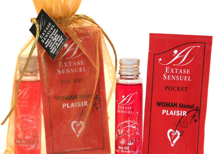 Red extase sensuel pocket hot oil in a clear glass bottle with silver cap and strawberry scent from extase sensual set nuits amour Reiseformat