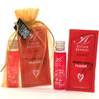 Red extase sensuel pocket hot oil in a clear glass bottle with silver cap and strawberry scent from extase sensual set nuits amour Reiseformat