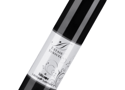 Schwarze zylindrische flasche extase sensuel silikon schmiermittel 30 ml mit glänzendem silbernen etikett