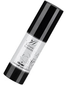 Schwarze zylindrische flasche extase sensuel silikon schmiermittel 30 ml mit glänzendem silbernen etikett