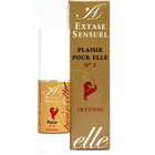 Eine gold-weiße parfümflasche mit rotem herz und label extase sensuel plaisir pour elle n°2 intense neben goldener box
