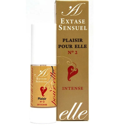 Eine gold-weiße parfümflasche mit rotem herz und label extase sensuel plaisir pour elle n°2 intense neben goldener box