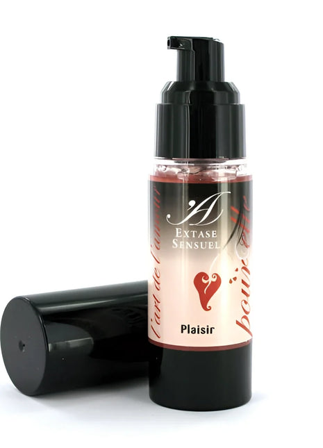 A sleek black pump bottle with clear glass and pinkish extase sensuel cream labeled with a red heart