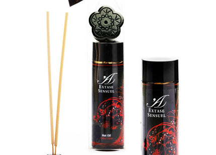 Schwarzes blumenförmiges reed diffuser set mit roten verzierten etiketten und goldakzenten extase sensual öl cuba libre 100 ml
