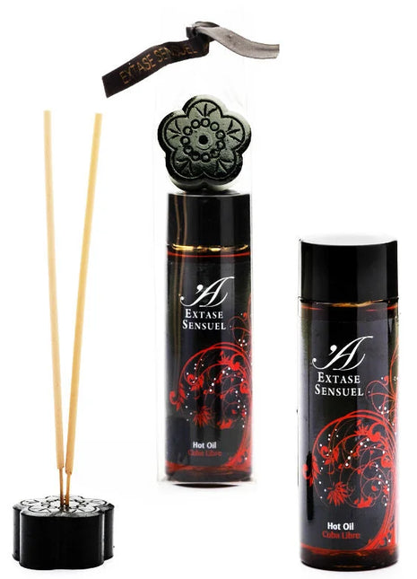 Schwarzes blumenförmiges reed diffuser set mit roten verzierten etiketten und goldakzenten extase sensual öl cuba libre 100 ml