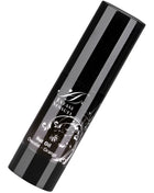 Schwarze zylindrische flasche mit silbernem ornamentetikett und extase sensuel branding für stimulierendes schokoladen-orangen reiseöl 35 ml