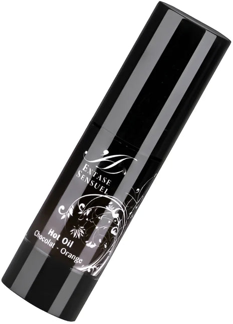 Schwarze zylindrische flasche mit silbernem ornamentetikett und extase sensuel branding für stimulierendes schokoladen-orangen reiseöl 35 ml