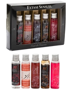 Schwarze Geschenkbox mit sechs kleinen Glasflaschen extase sensuel intime Gleitmittel in verschiedenen Farben und Düften