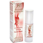 Eine elegante weiße zylinderflasche mit extase sensual ultra silk touch massageöl passion rituals seidenöl aus carnaubawachs neben rosa- und cremeverpackung mit rotem schmetterling