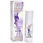 Ein schlanker weißer zylinderförmiger behälter mit extase sensuel ultra silk touch satin nachtmassageöl und lila schmetterlingsmotiv