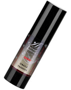 Schwarze zylindrische flasche mit glänzendem finish und rotem silbernem etikett extase sensual unisex stimulans oral passion lubricant