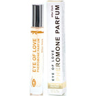 A sleek transparent glass rollerball bottle with silver cap and gold eye of love pheromon parfum after dark label beside white box