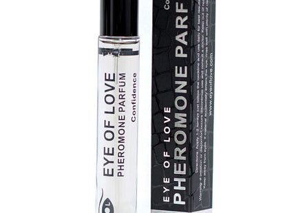 Klare glas-rollerflasche mit schwarzem deckel und weißem etikett eye of love pheromon parfum von confidence neben schwarzer box
