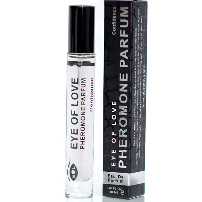 Klare glas-rollerflasche mit schwarzem deckel und weißem etikett eye of love pheromon parfum von confidence neben schwarzer box
