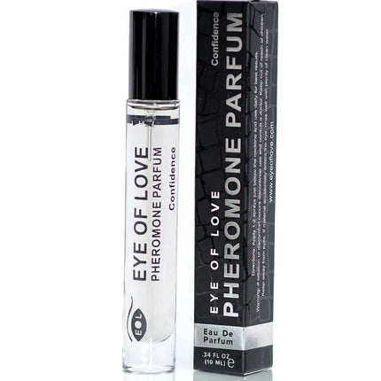 Klare glas-rollerflasche mit schwarzem deckel und weißem etikett eye of love pheromon parfum von confidence neben schwarzer box