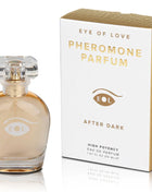 Ein klarer Glasparfümflakon eye of love after dark mit facettiertem Kristallverschluss und goldenen Akzenten