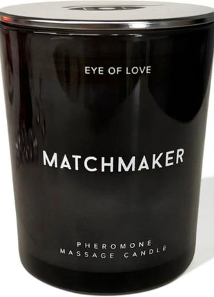 Schwarze glaskerze eye of love matchmaker mit silberdeckel und pheromon-massageduft 150 ml