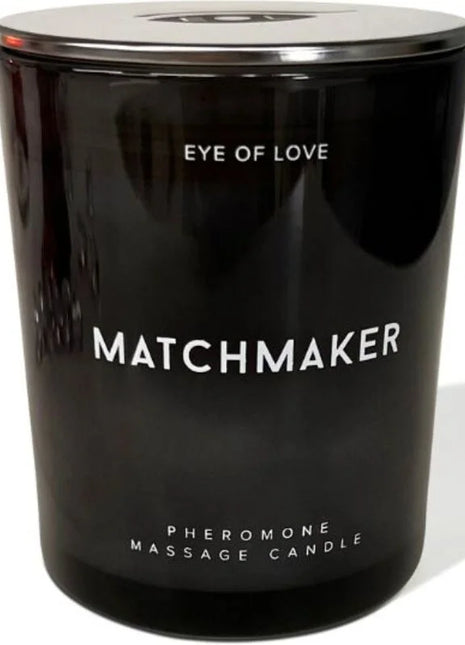 Schwarze glaskerze eye of love matchmaker mit silberdeckel und pheromon-massageduft 150 ml