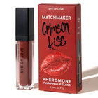 Matchmaker crimson kiss plumping lip gloss in clear tube with black cap and red packaging featuring bold lips design