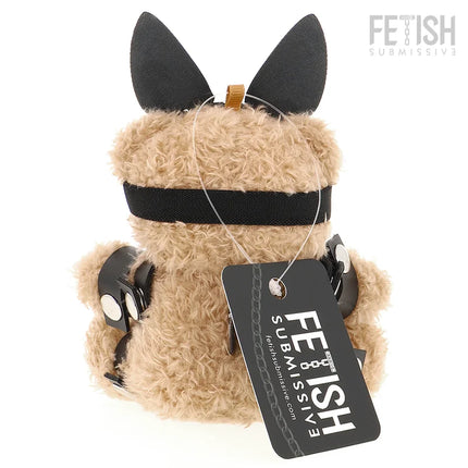 Tan muffteddybär mit schwarzen ohren, kopfbügel und lederarmbändern im bdsm modell 5 fetish submissive stil