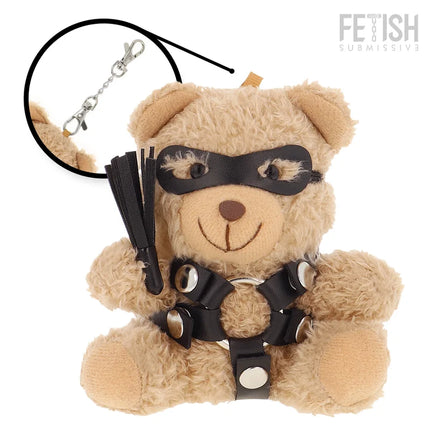 Tan plüsch teddy bear in schwarz ledermaske und harness mit silber metall und peitsche fetisch submissive bdsm modell