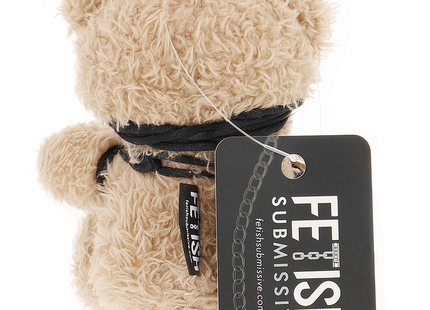 Beiger fetisch submissive plush teddybär mit schwarzem seilgeschirr und markenetikett modell winnie teddybär bdsm