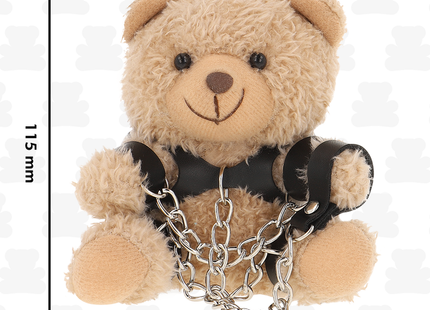 Beiger plüsch-teddybär mit schwarzem lederharness und silberner ketten im fetisch submissive yogi teddybär bdsm modell 1