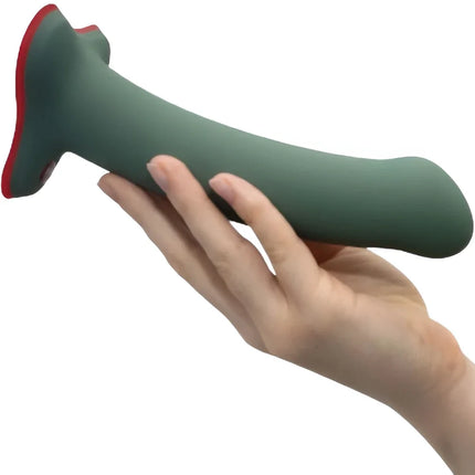 Ein mattgrüner fun factory magnum dildo wild olive aus silikon mit rotem Saugfußständer