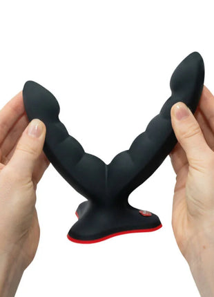 Schwarzer silikon analplug mit roter akzentlinie und strukturierter segmentierung von fun factory ryde doppeldildo massager