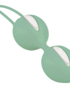 Ein mintgrünes silikon-doppel-blasen vaginalgewicht mit weißen innerkammern von fun factory smartballs duo