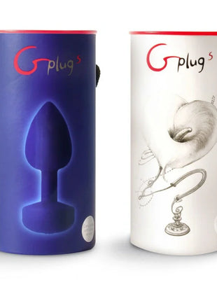 Zwei zylindrische funtOys g-plugs anal-vibrator produktboxen in blau und weiß mit leuchtender silhouette und detaillierter skizze