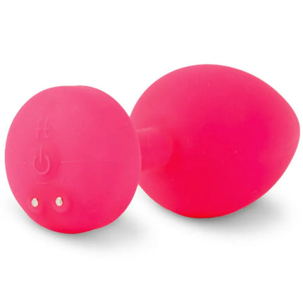 Hellpinkfarbener silikon anal-vibrator eggform mit power-knopf und zwei silbernen kontakten von funtoys gplug