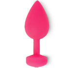 Ein lebhaft pinkfarbener teardrop-förmiger butt plug aus silikon mit sechseckiger basis von funtoys/gplug anal-vibrator gross 3,9 cm