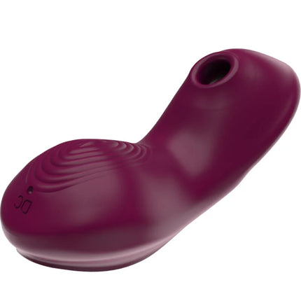 Ein elegantes dunkelviolettes silikonspielzeug mit glattem, geschwungenem design und wellenstruktur für g punkt stimulation