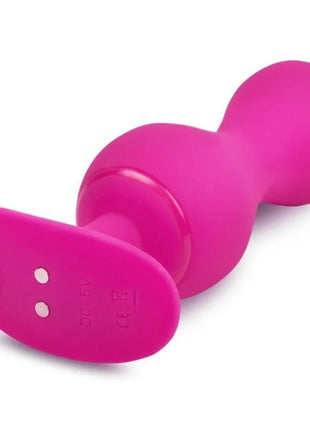 Hellrosa silikon vibrierender butt plug mit gerundetem kopf und ovaler basis mit zwei weißen anzeigelichtern aus der gbBalls 3 Kegelbälle mit app serie