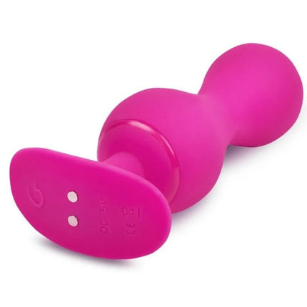 Hellrosa silikon vibrierender butt plug mit gerundetem kopf und ovaler basis mit zwei weißen anzeigelichtern aus der gbBalls 3 Kegelbälle mit app serie