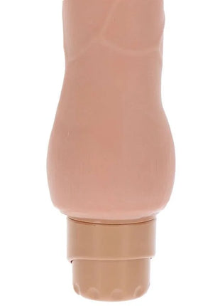 Beiger silikon dildo mit glatter vibratorhaut, texturiertem griff und abgerundetem fuß, duale dichte