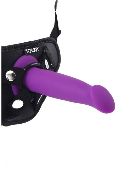 Lila silikon dildo mit schwarzem harness von toyjoy get real goodhead dong 12 cm