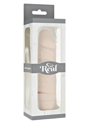Ein beiger get real mini classic vibrator skin aus 100 prozent reinem silikon in klarer plastik- und grauer kartonverpackung