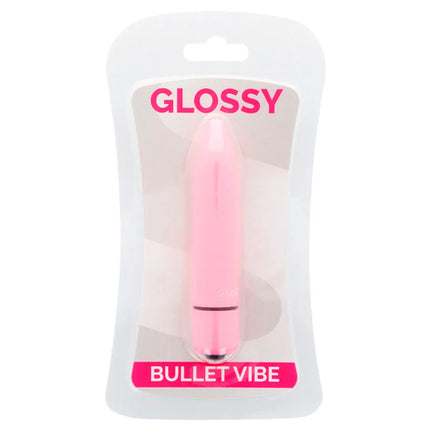 Glänzender pinker dünner vibrierender dildo aus kunststoff in transparenter plastikverpackung namens glossy rosa