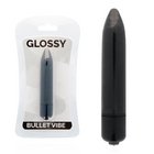 Schwarzer glossy bullet vibro mit glänzender oberfläche in verpackung fürs dezente vibrieren