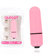 Glänzender kleiner kugel-vibrator aus rosa plastik mit schwarzem akzentband und spitze